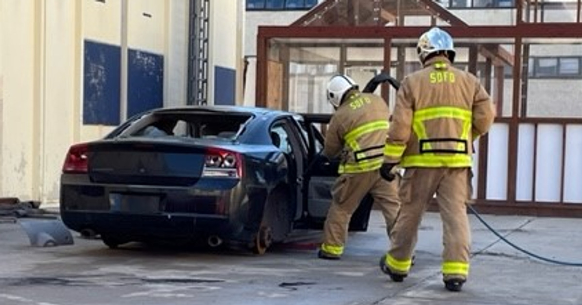 Hands-on Cobra training on a car.